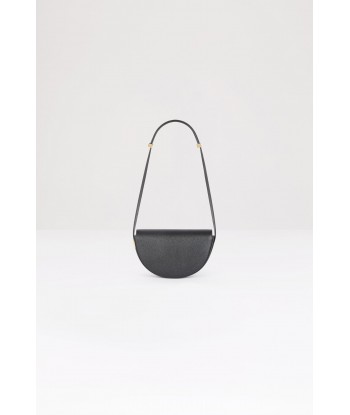 Le Petit Patou bag in leather store